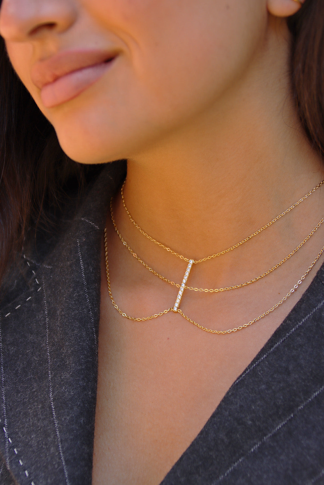 Collier à triple barre